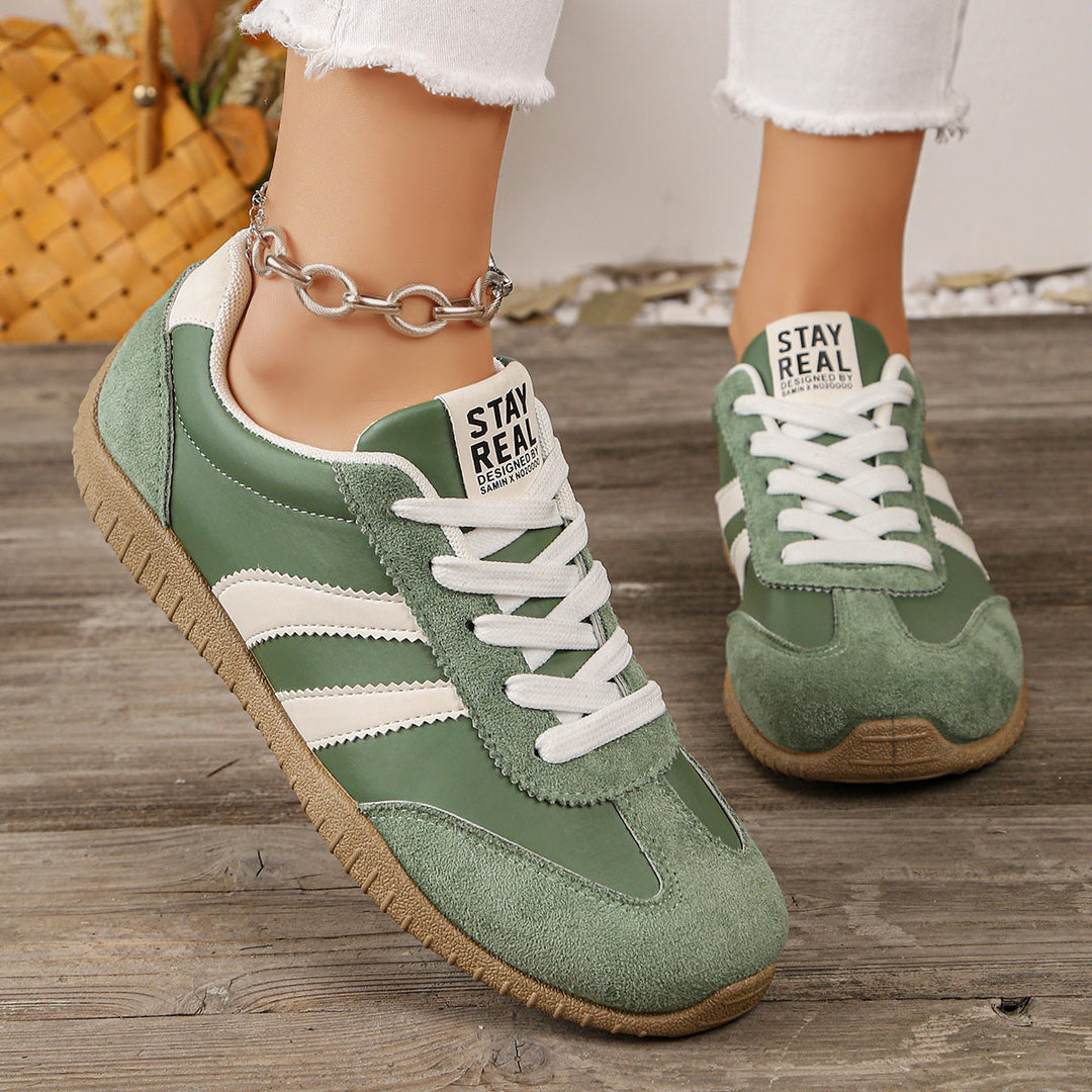 Women's supportive wide fit trainers with arch support, ideal for comfort walking & foot pain relief.