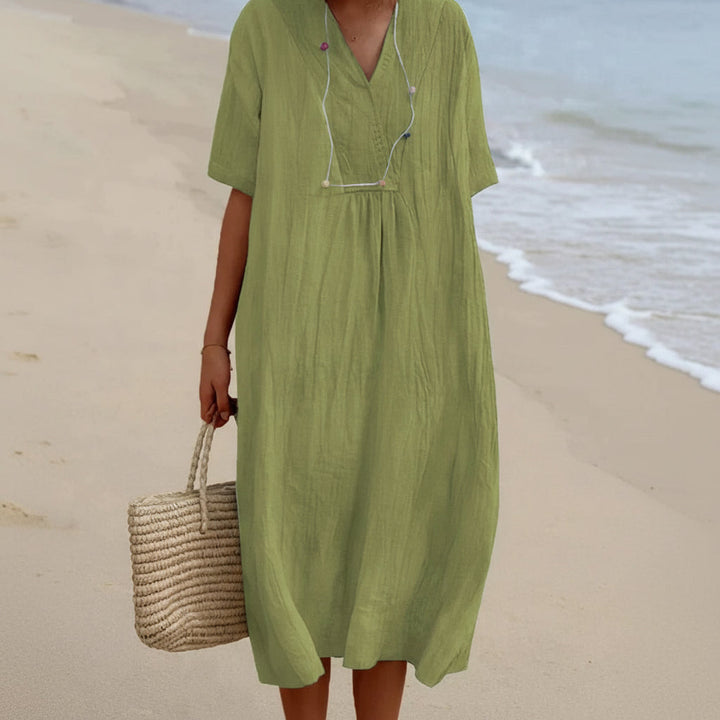 Comfortable women's A-line midi summer dress with V-neck. Perfect for effortless style & casual elegance.