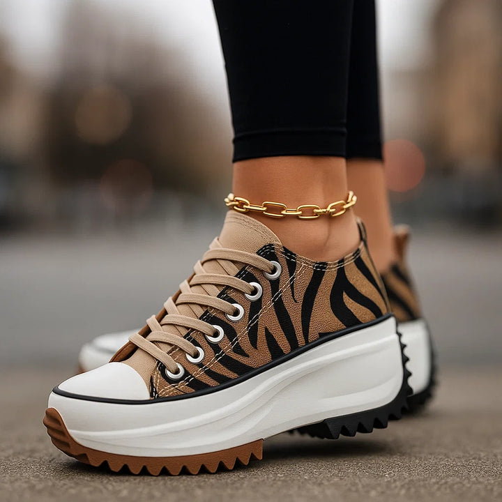 Women's Arlina Rise platform sneakers for elevated comfort, featuring orthopedic & shock-absorbing design.