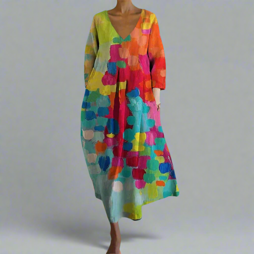 Women's artistic bohemian colorful maxi dress with abstract print, perfect for summer, vacation, or festival wear.