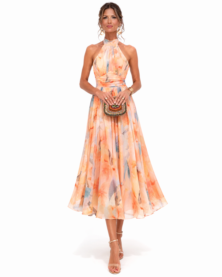 Women's artistic watercolor print maxi dress with halter neck, ideal for summer elegance & resort wear.