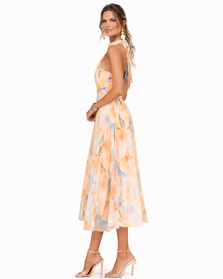 Stylish women's sleeveless watercolor print halter neck maxi dress, perfect for party, casual, or resort.