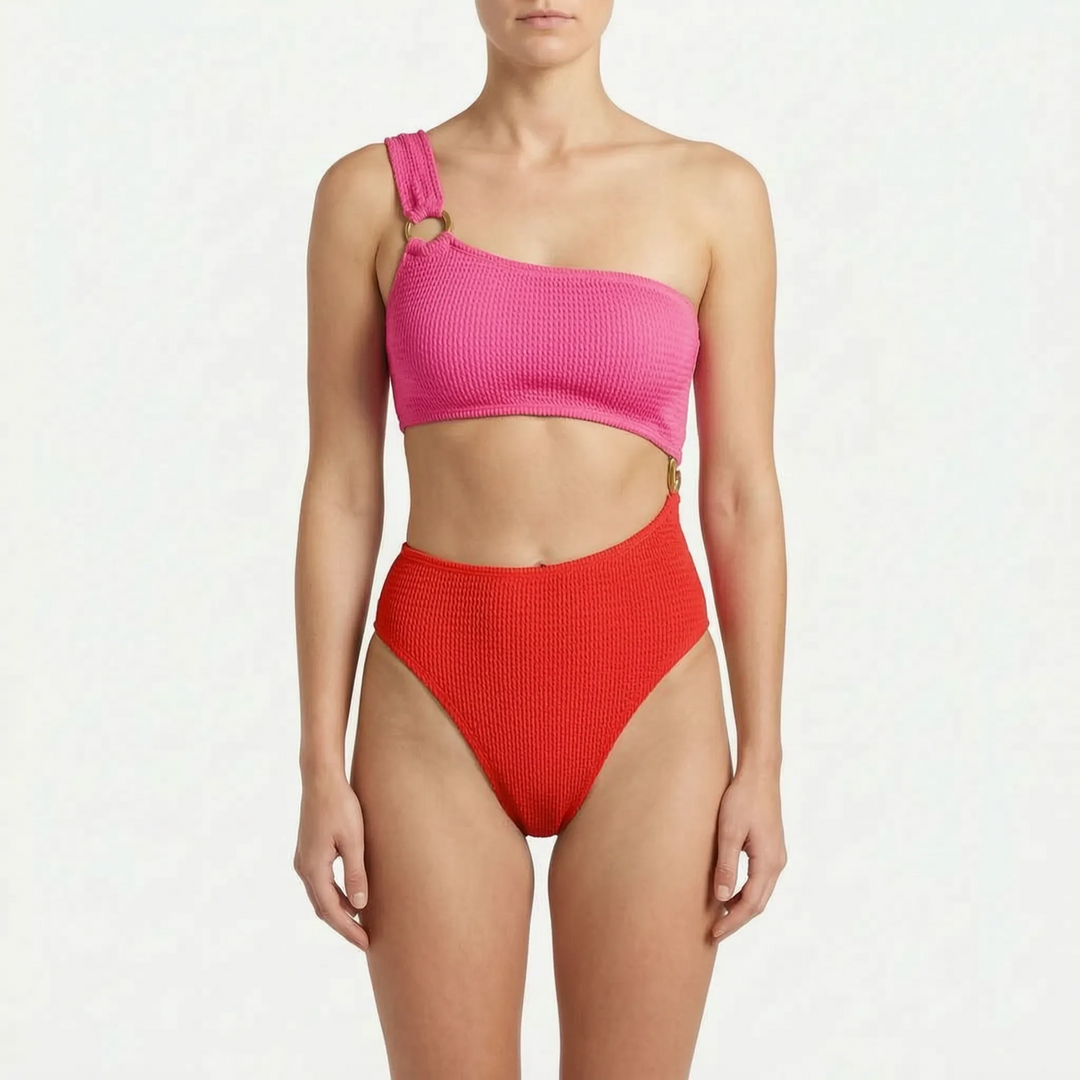 Stylish women's asymmetric one-piece monokini swimsuit with modern cut-outs & gold accents, ultimate beachwear.