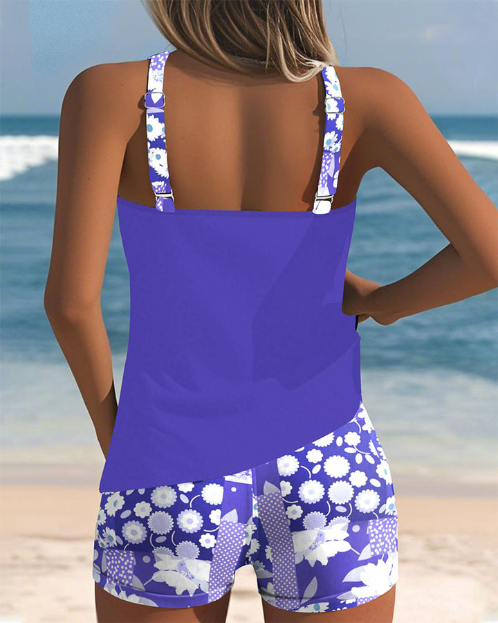 Modest two-piece women's swimwear: belly-covering tankini & sporty swim shorts for confident vacation days.
