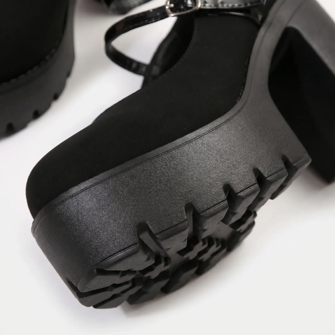 Comfortable women's platform Mary Jane pumps with a round toe, sturdy chunky block heel, and adjustable strap.