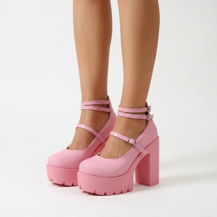 Elegant black women's Mary Jane platform pumps, showcasing a chunky block heel and a stylish adjustable buckle.