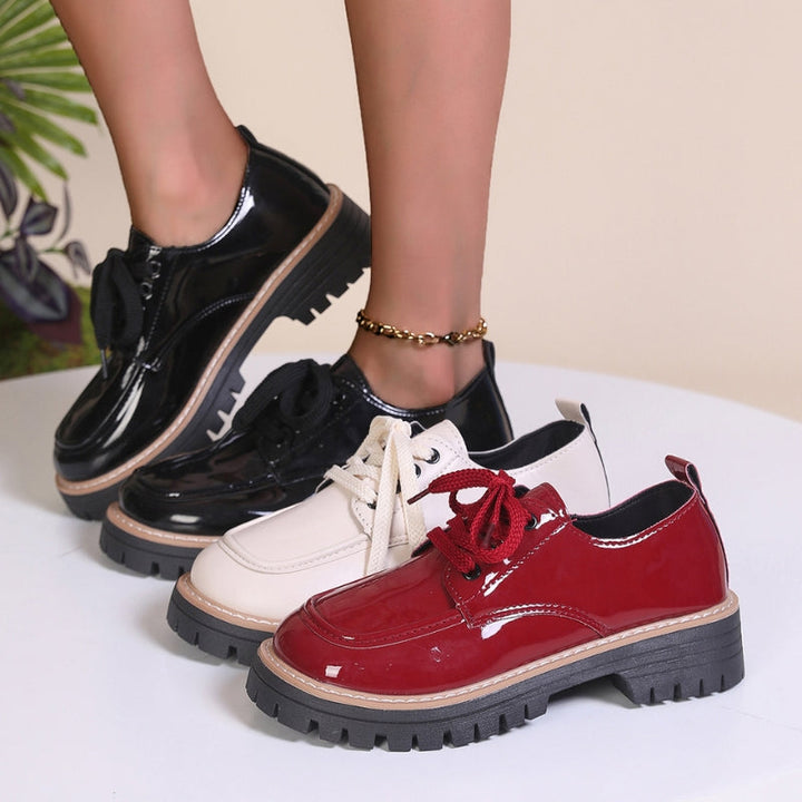 Versatile women's chunky platform loafers available in multiple colors, offering bold style & comfort.