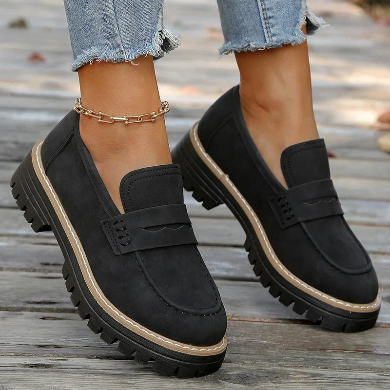Dressy casual women's loafers, black chunky platform, providing all-day comfort & elegant style.