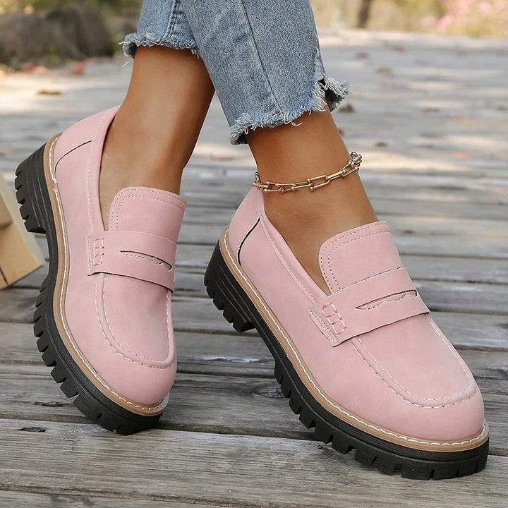 Stylish women's chunky platform loafers, perfect for adding a trendy edge to any casual outfit.