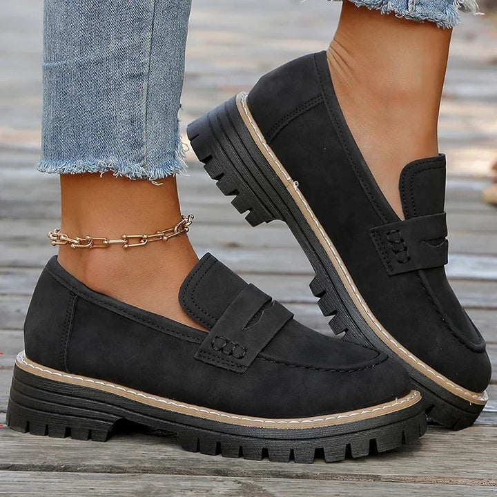 Comfortable women's slip-on loafers with a trendy chunky platform, ideal for walking & fashion.