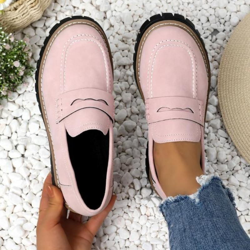 Trendy women's platform loafers, a comfortable slip-on style with a round toe for spring fashion.