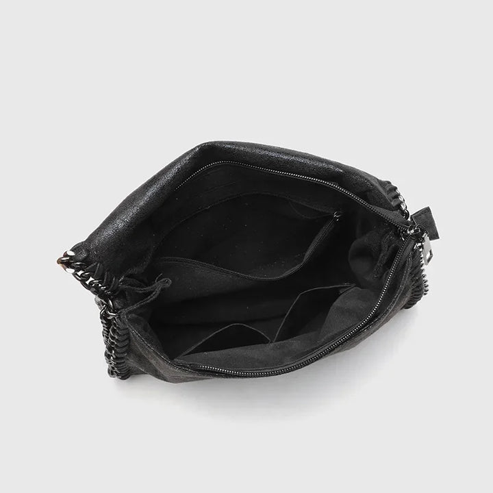 Vintage finish black gothic shoulder bag for women, with an elegant chain strap, a versatile fashion accessory.