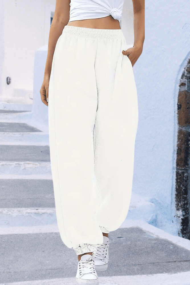 Everyday women's white high-rise joggers, elastic waist. Perfect comfortable loungewear bottoms.