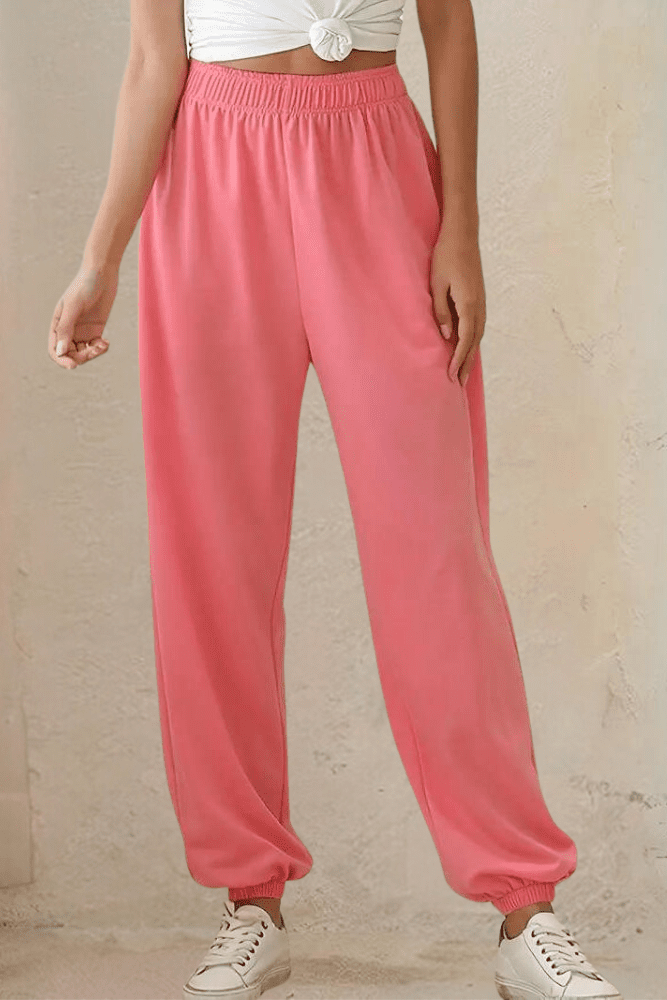 Women's high-rise joggers in light blue, elastic waist. Great for comfortable, relaxed casual style.