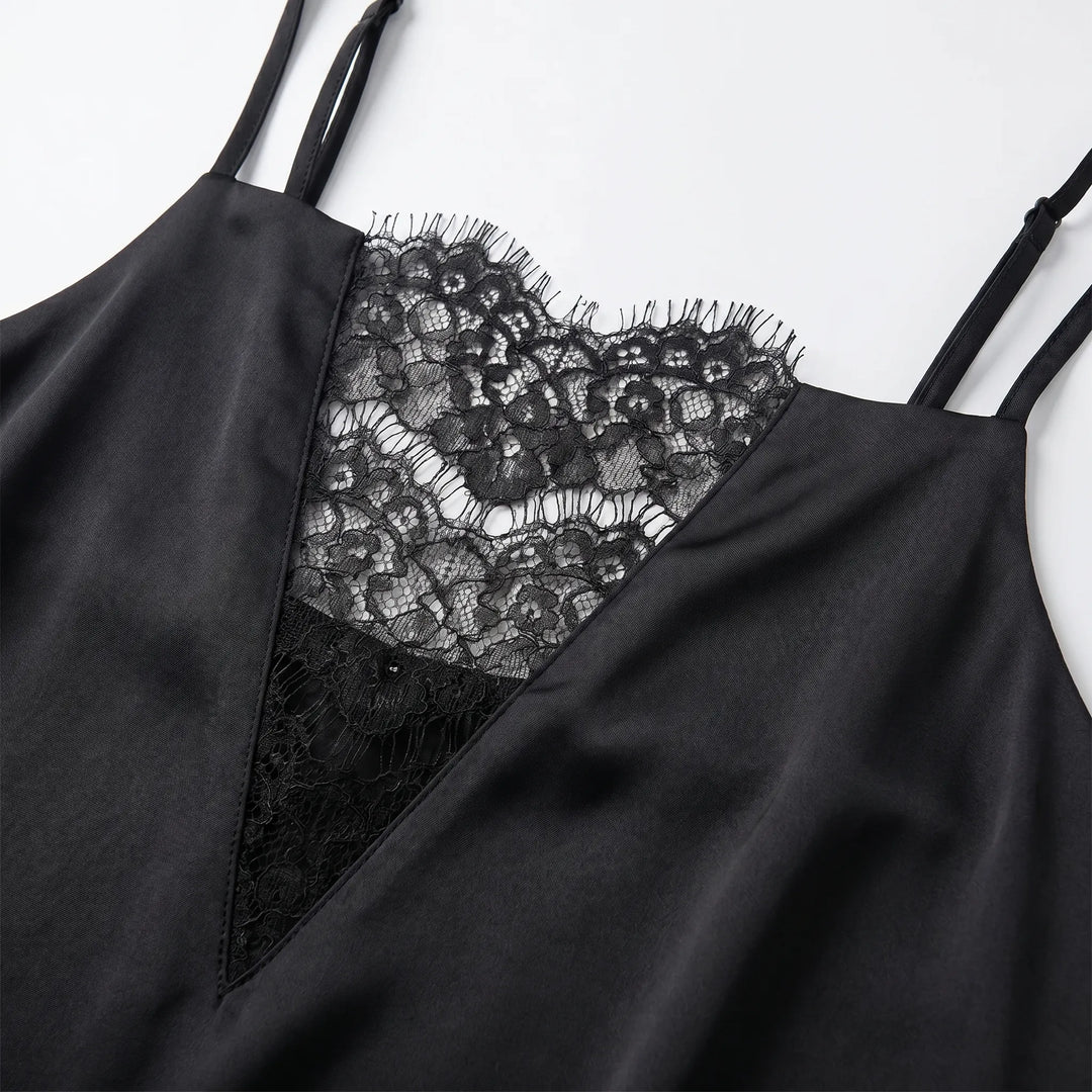 Stylish women's black lace-trimmed slip dress for effortless evening style. Perfect party or night out mini dress.