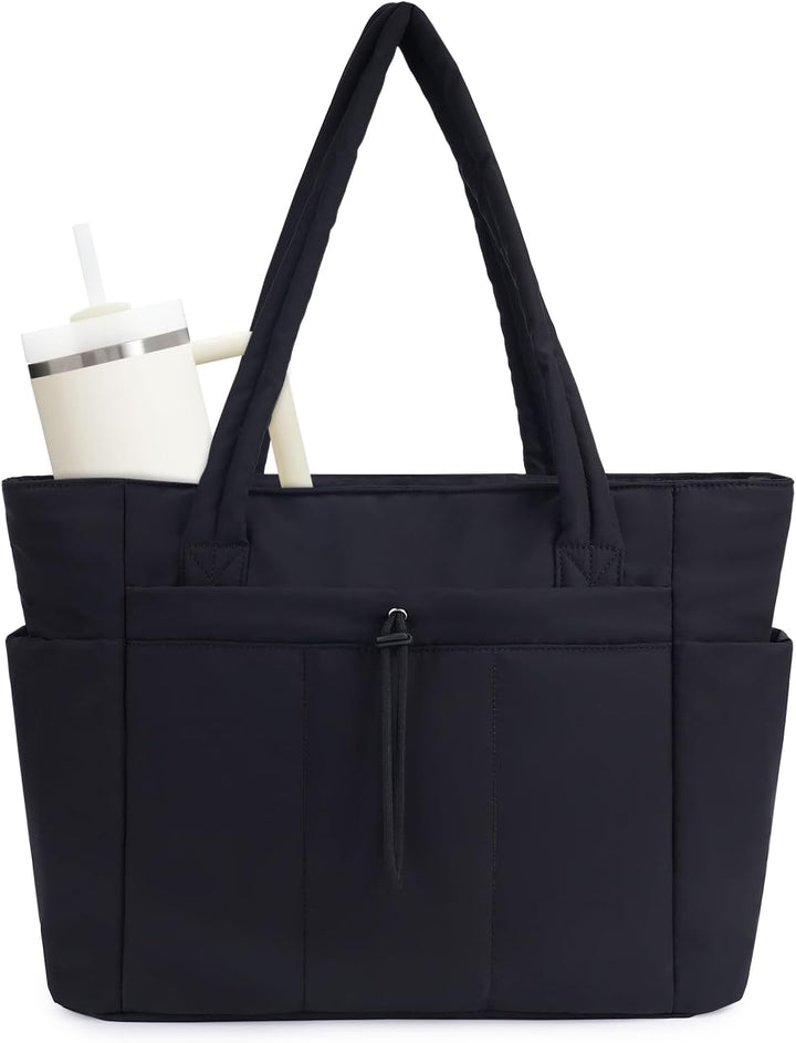 Women's quilted work tote with a laptop sleeve, cup holder, and multiple organization pockets.
