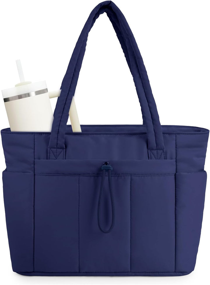 Travel-ready women's puffer tote, gray, with laptop sleeve, cup holder, and zipper closure.