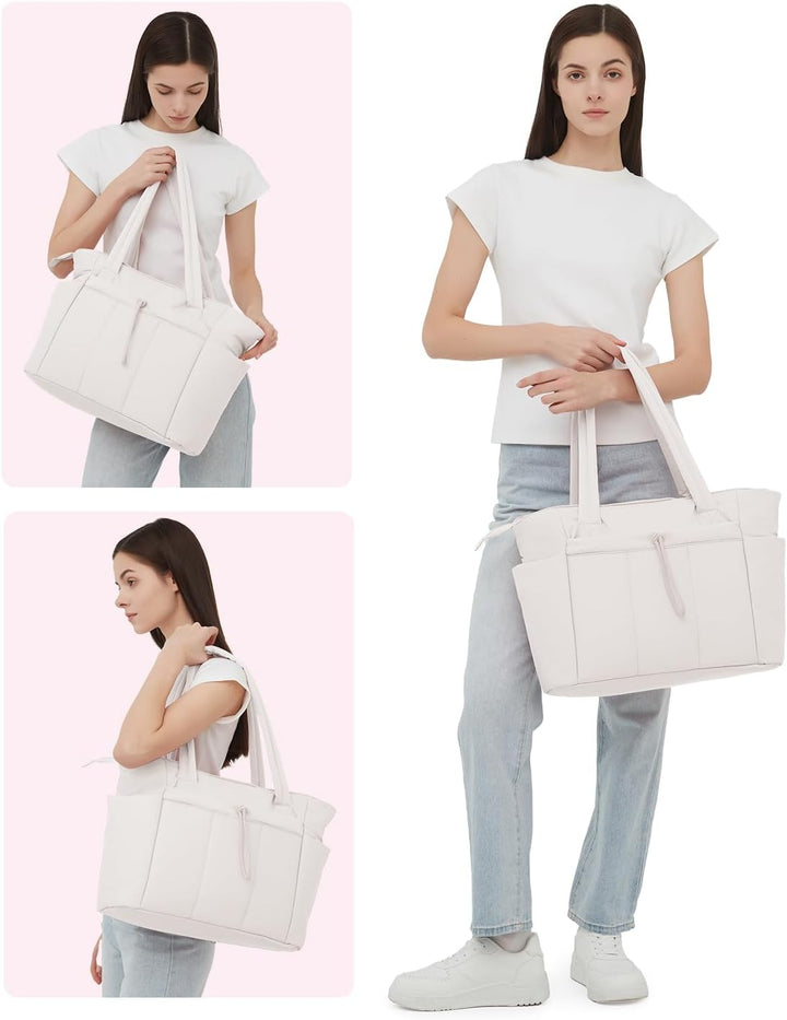Women's organizational quilted tote for daily use, with laptop sleeve & cup holder access.