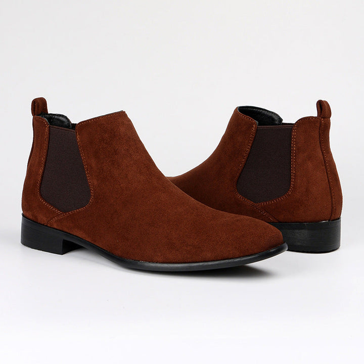 Comfortable women's slip-on ankle boots, featuring elastic goring and a stylish block heel for easy wear.