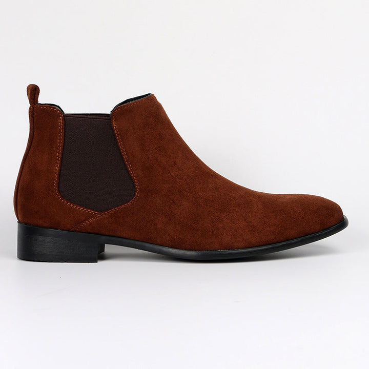 Chic women's Chelsea boots with a modern block heel, perfect for casual outfits or smart office wear.