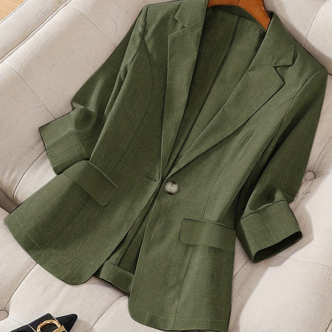 Navy modern women's cropped blazer. Tailored elegant outerwear, perfect for stylish office & professional looks.