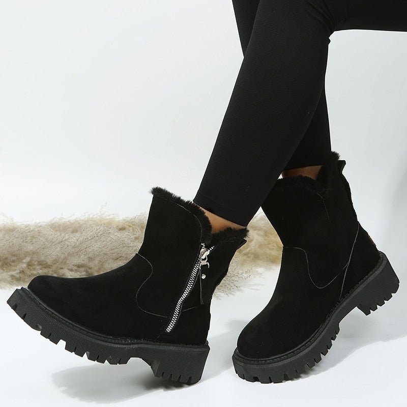 Women's black Toasty winter snow boots for ultimate warmth & comfort in icy conditions.