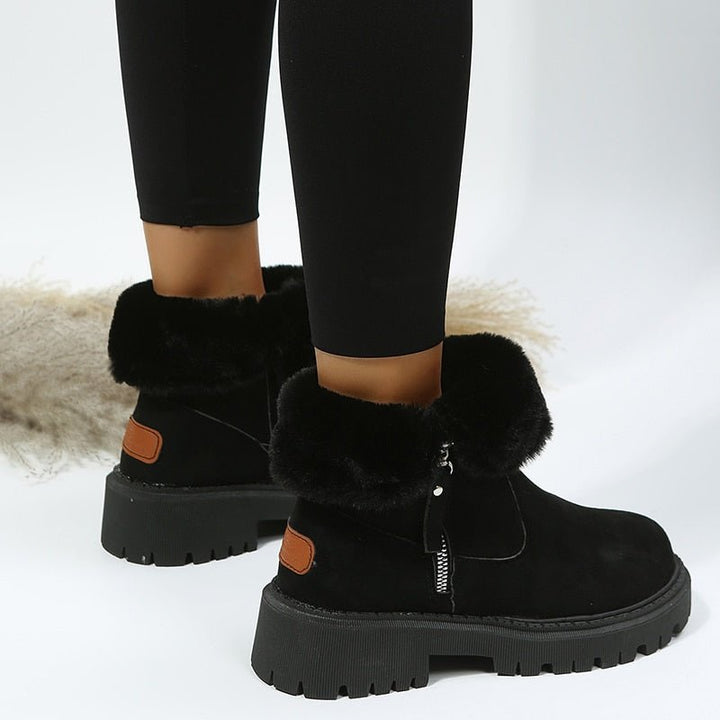Slip-on women's winter boots with durable traction, ideal for snow & ultimate warmth.