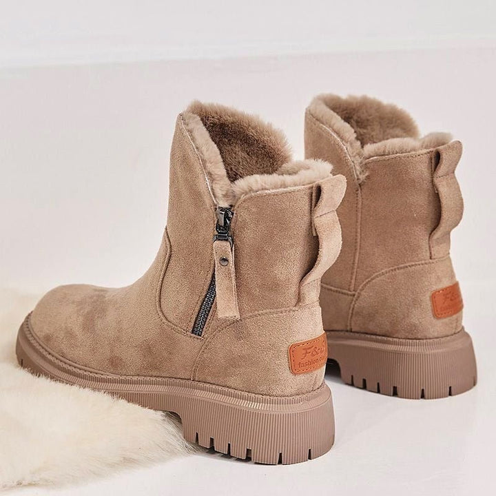 Cozy women's winter boots, providing ultimate warmth & comfort for snowy outdoor activities.