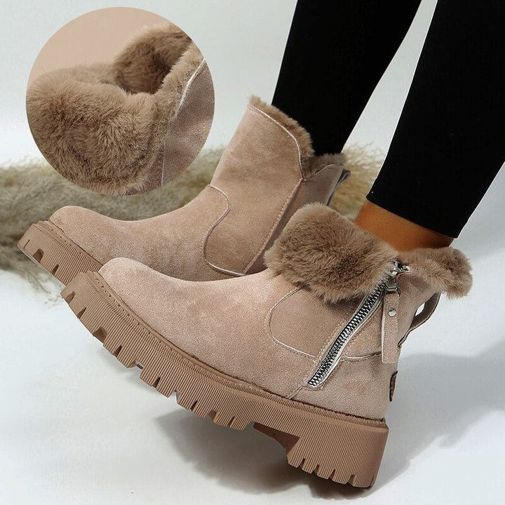 Fashionable women's snow ankle boots, offering warmth, comfort, and good traction for winter.
