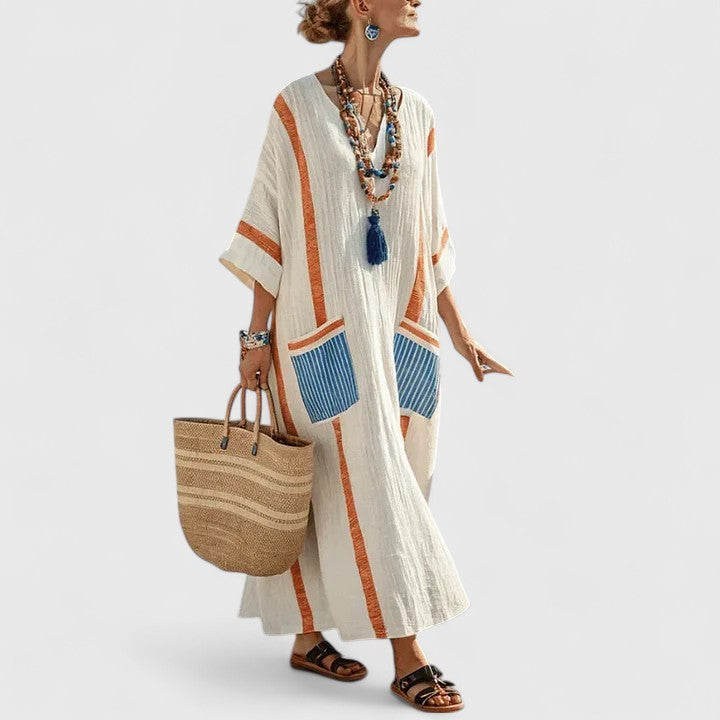 Casual women's flowy maxi dress in bohemian style, featuring practical pockets for everyday elegance.