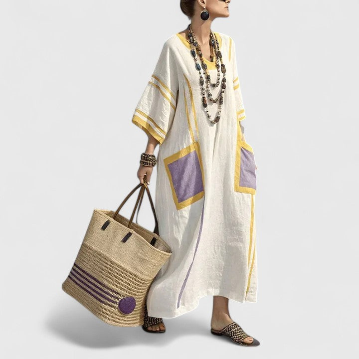 Long women's bohemian maxi dress, a stylish and comfortable option with convenient side pockets.
