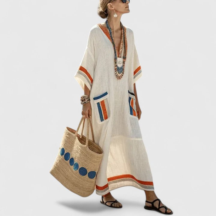 Versatile women's summer boho maxi dress with pockets, suitable for casual or vacation styling.