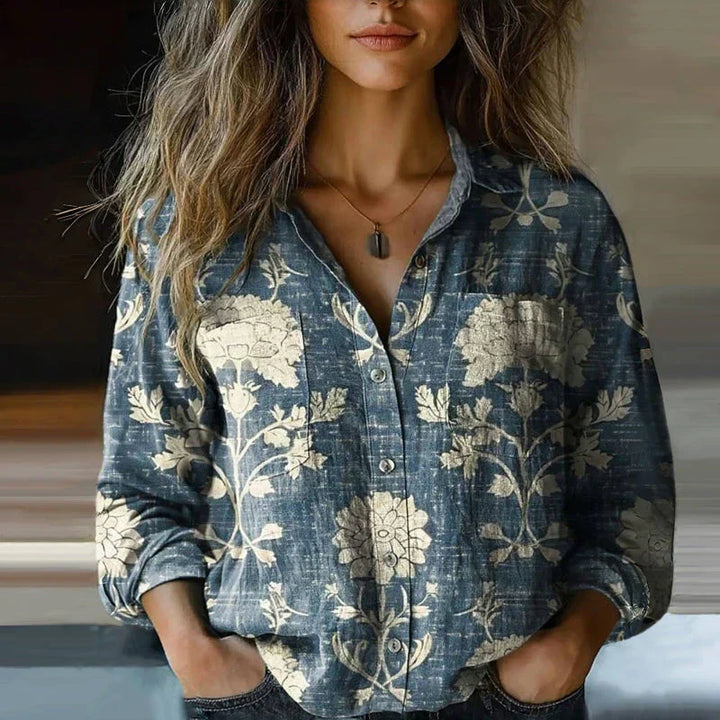 Casual women's blouse, featuring a vibrant bohemian print and a comfortable, relaxed fit. Great for summer.