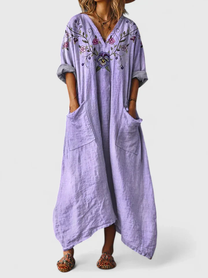 Bohemian printed women's oversized jumpsuit featuring wide legs and pockets for ultimate comfort.
