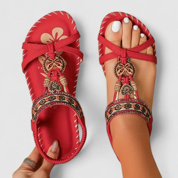 Women's boho beaded flat toe ring sandals with elastic strap, perfect for summer comfort.