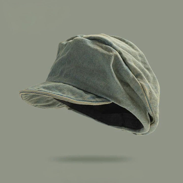 Stylish denim beret for women, featuring a boho-chic design. Perfect retro-style casual hat accessory.