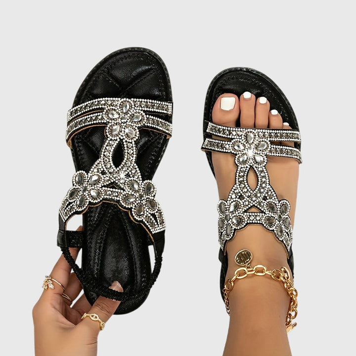 Elegant rhinestone embellished flat sandals, women's boho summer vacation footwear.