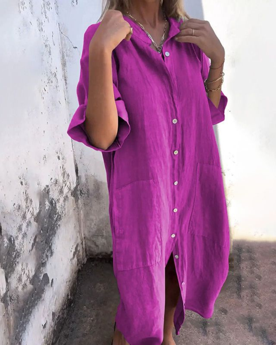 Long flowy women's maxi dress with vibrant boho floral pattern & button front, great for day wear.