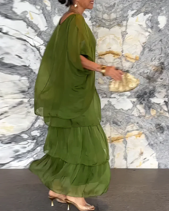 Women's boho flowy tiered maxi skirt and batwing top set, perfect for summer vacation.