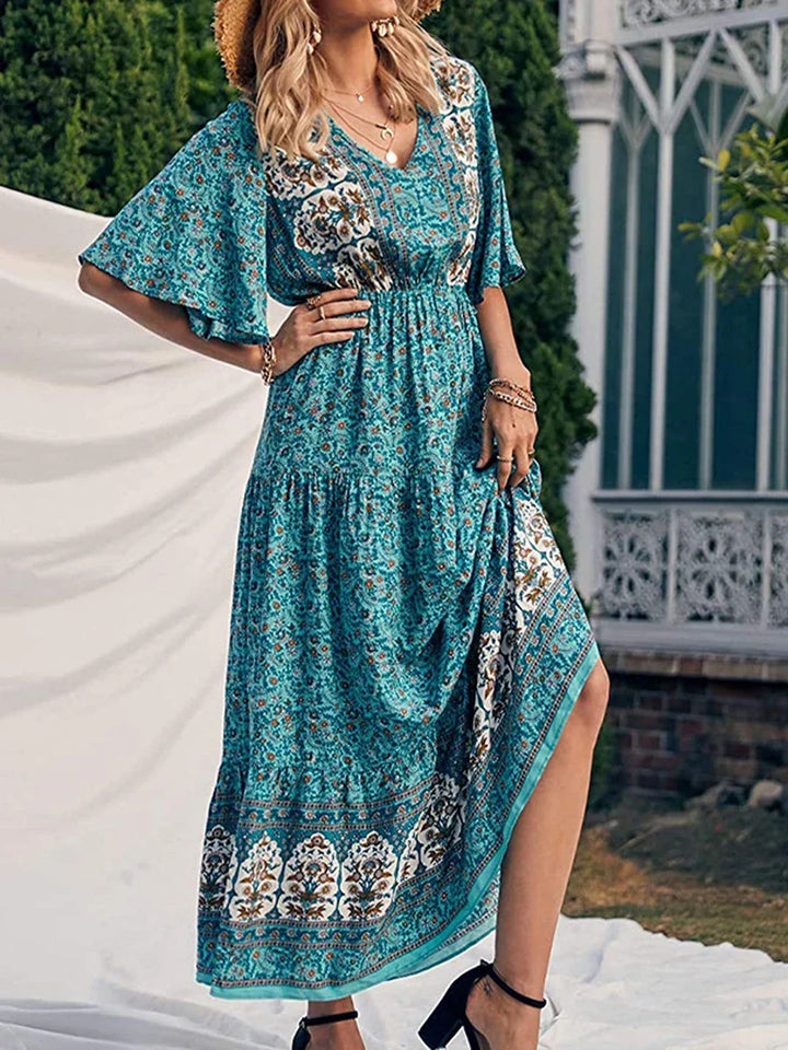 Women's elegant boho summer V-neck dress, short sleeve with a unique print, perfect for fashion.