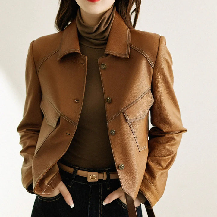 Women's Bold Cropped Moto Jacket. Stylish black biker jacket, edgy fashion statement outerwear.