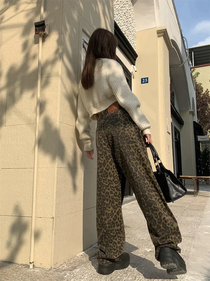 Women's bold leopard print jeans, high-waisted denim for trendy fashion & statement casual wear.