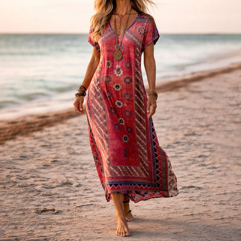 Boho women's V-neck maxi dress featuring a vibrant botanical floral print and a comfortable flowy fit.