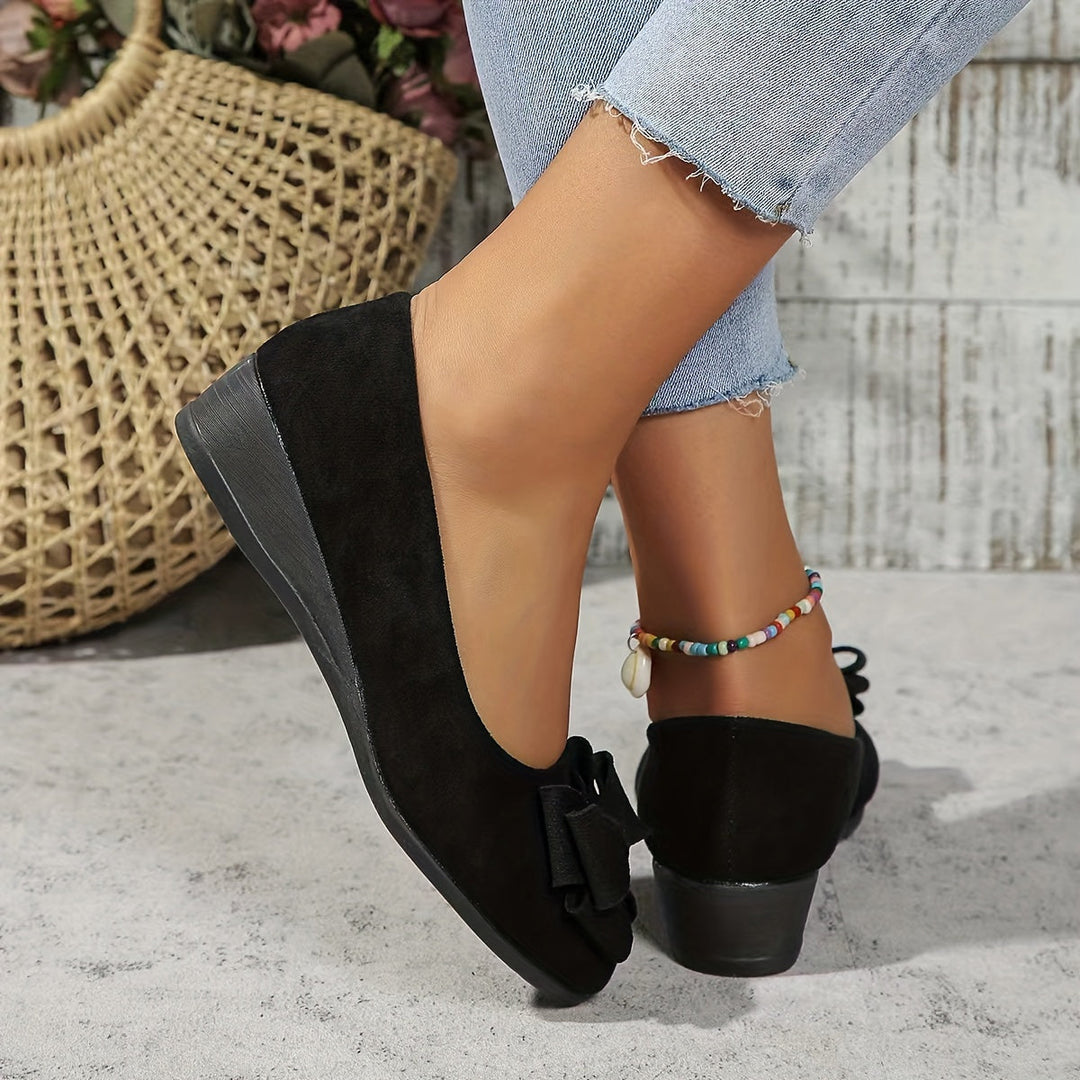 Versatile women's slip-on wedge ballet flats with a bow, ideal for daily wear.