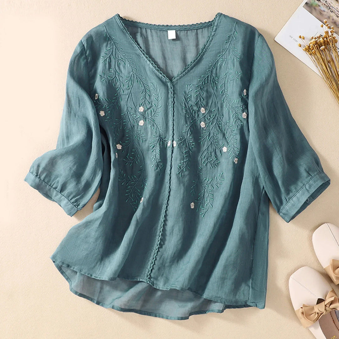 Women's breathable embroidered shirt, a flowy blouse with artistic detail for summer casual elegance.