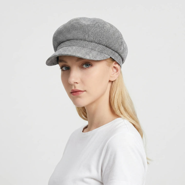 Lightweight open-weave sun hat for women. Breathable summer hat, perfect for beach days & travel protection.