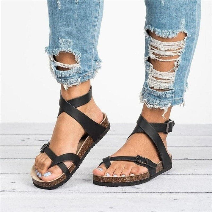 Stylish women's open-toe flat strappy sandals, offering versatile and comfortable footwear for casual summer fashion.