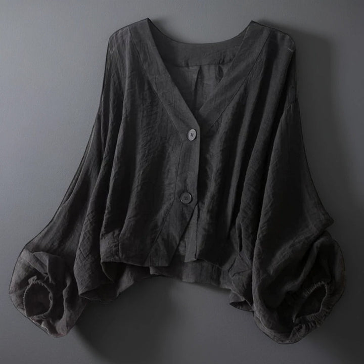 Elegant women's balloon sleeve top with relaxed fit & button front, a versatile choice for daily fashion.