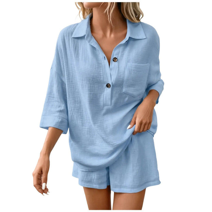 Relaxed fit women's two-piece short set with collared top & drawstring shorts, ideal for summer casual or beachwear.