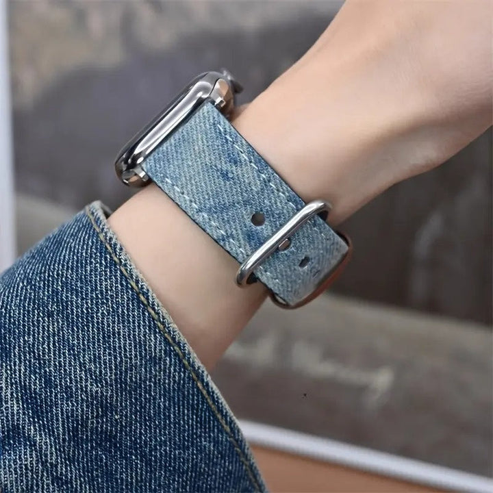 Blue denim smartwatch strap for women, durable and fashionable accessory.